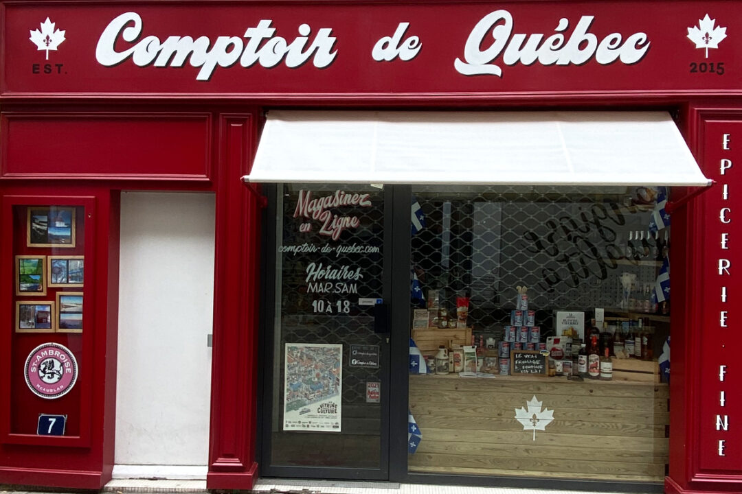 Store bannette à projection blanc installé au Comptoir de Québec à Nantes (44) par Espacio